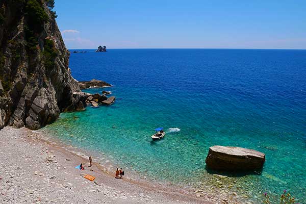 Fornillo Beach near Positano with Mediterranean water and cliffs