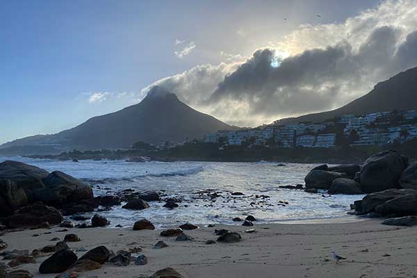 Small Beta Beach in Bakoven near Camps Bay with granite rocks and Atlantic Ocean